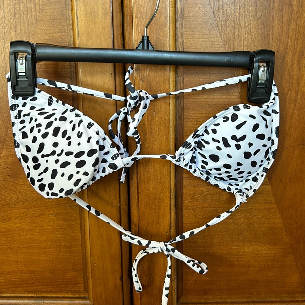 Black and white cow print biking tie top size large